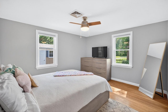 24 Tabor Rd, Forestdale, MA 02644 - bedroom featuring multiple windows, light wood-style floors, and ceiling fan