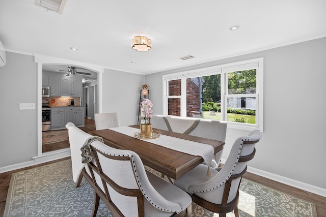 24 Tabor Rd, Forestdale, MA 02644 - dining area with wood finished floors, ceiling fan, arched walkways, crown molding, and recessed lighting