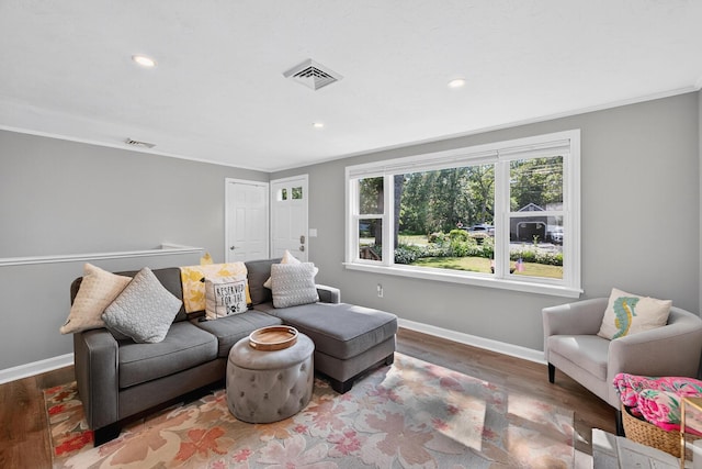 24 Tabor Rd, Forestdale, MA 02644 - living room featuring wood finished floors, ornamental molding, and recessed lighting