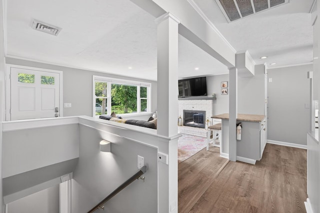 24 Tabor Rd, Forestdale, MA 02644 - hallway featuring wood finished floors, crown molding, and recessed lighting