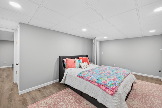 24 Tabor Rd, Forestdale, MA 02644 - bedroom featuring wood finished floors, recessed lighting, and a drop ceiling