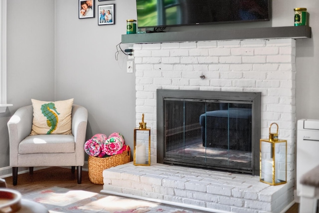 24 Tabor Rd, Forestdale, MA 02644 - detailed view of a fireplace and wood finished floors