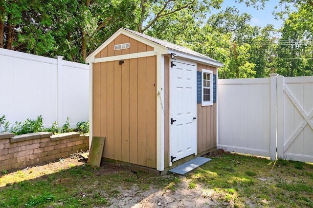 24 Tabor Rd, Forestdale, MA 02644 - view of shed with a fenced backyard and a gate