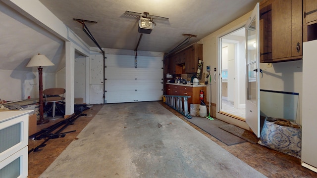 garage featuring a garage door opener