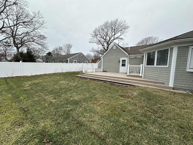 view of yard with a wooden deck