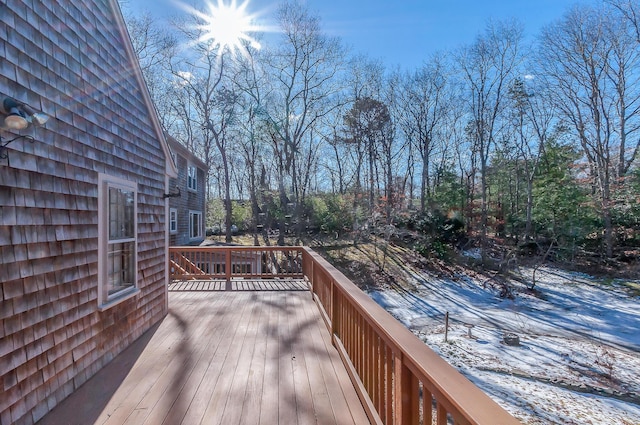 view of snow covered deck