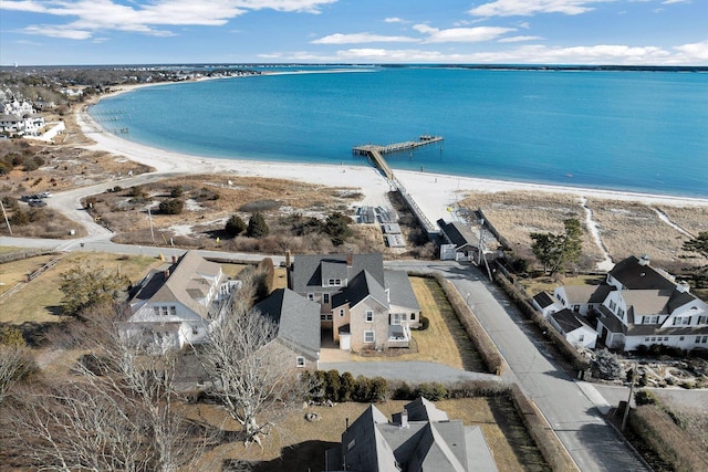 bird's eye view with a beach view and a water view