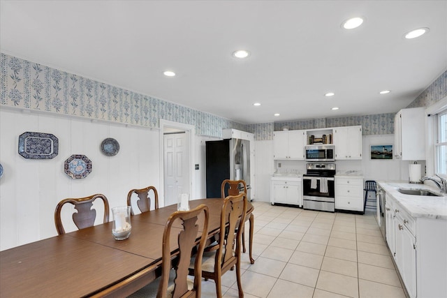 tiled dining area with sink