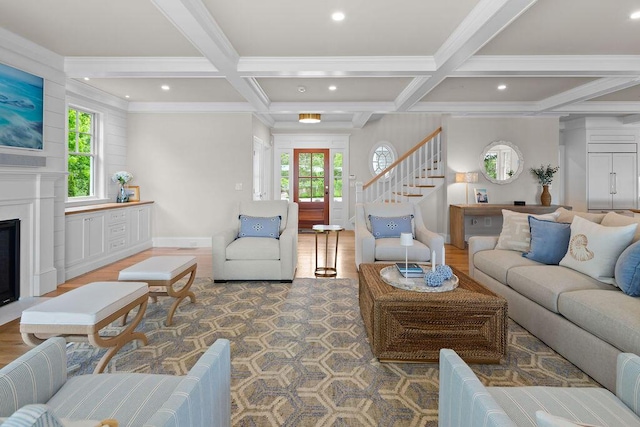 64 Pershing Ln, Orleans, MA 02653 - living area with coffered ceiling, healthy amount of natural light, beam ceiling, stairway, and recessed lighting