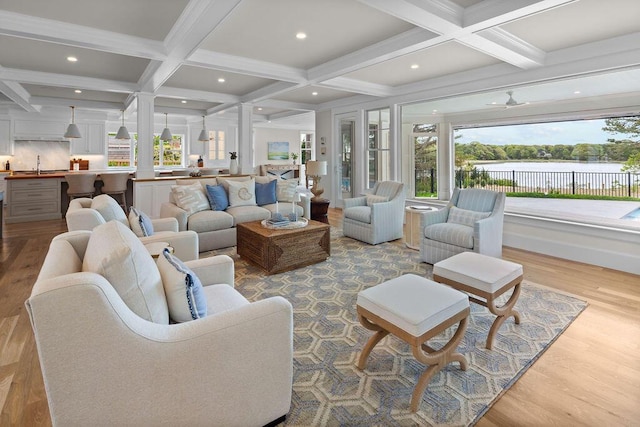 64 Pershing Ln, Orleans, MA 02653 - living area featuring coffered ceiling, wood finished floors, beamed ceiling, a water view, and recessed lighting