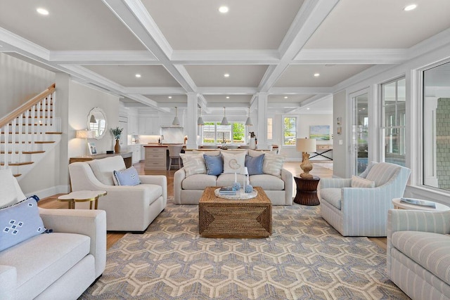 64 Pershing Ln, Orleans, MA 02653 - living room with coffered ceiling, wood finished floors, beam ceiling, stairs, and recessed lighting