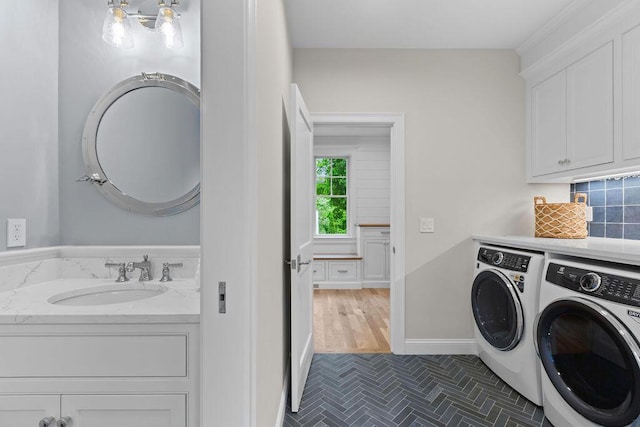 64 Pershing Ln, Orleans, MA 02653 - laundry area with separate washer and dryer and cabinet space