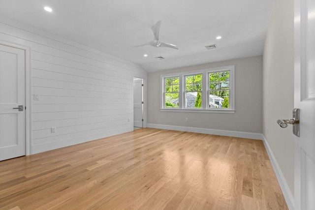 64 Pershing Ln, Orleans, MA 02653 - spare room featuring light wood-type flooring, ceiling fan, recessed lighting, vaulted ceiling, and baseboards
