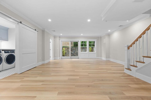64 Pershing Ln, Orleans, MA 02653 - unfurnished living room with a barn door, washing machine and clothes dryer, crown molding, light wood-style floors, and recessed lighting
