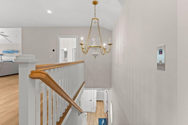 64 Pershing Ln, Orleans, MA 02653 - stairs with wood finished floors and a chandelier