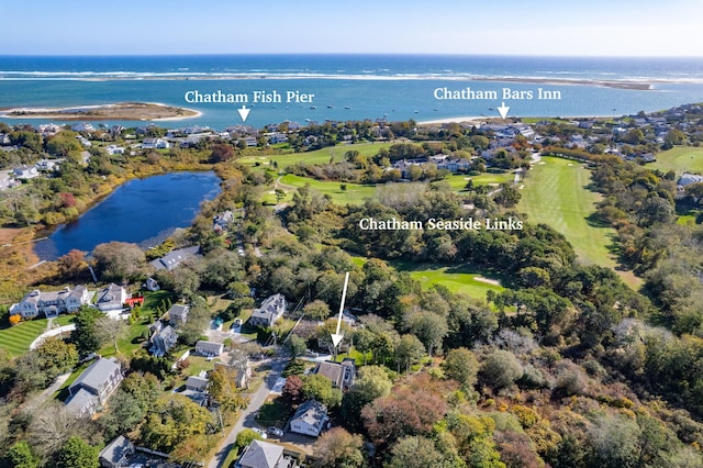 birds eye view of property featuring a residential view, a water view, and golf course view