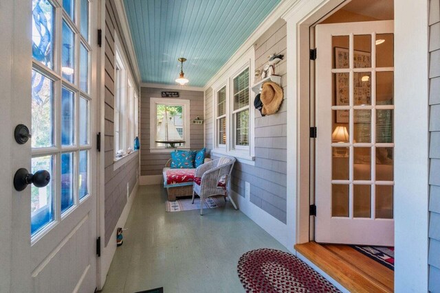 sunroom featuring plenty of natural light