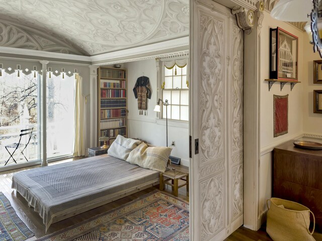 bedroom with ornamental molding