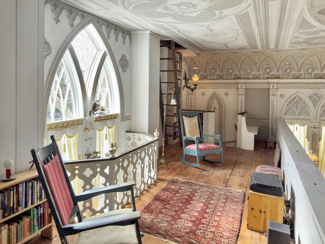 sitting room featuring light hardwood / wood-style floors