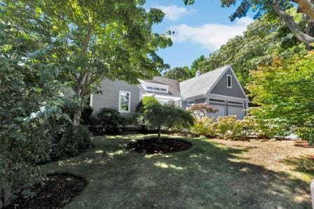 view of yard featuring a garage