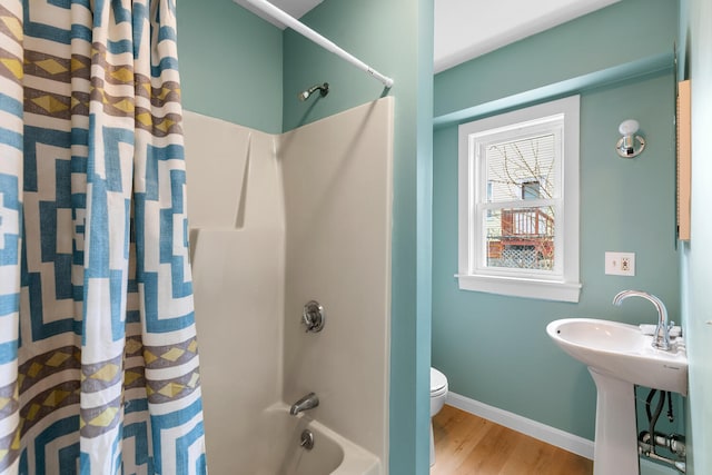 104R Homes Ave, Boston, MA 02123 - full bathroom with shower / tub combo with curtain, wood finished floors, toilet, and baseboards