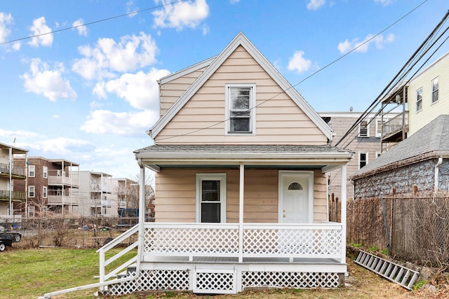 104R Homes Ave, Boston, MA 02123 - view of front of home featuring a porch and a shingled roof