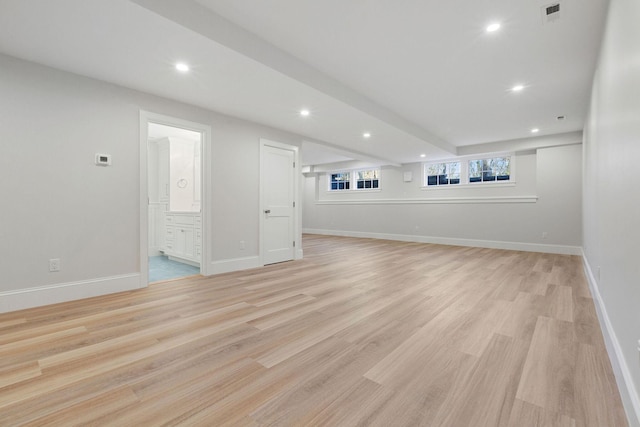 unfurnished living room with light hardwood / wood-style flooring