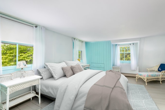 250 Scraggy Neck Rd, Cataumet, MA 02534 - bedroom with a baseboard radiator and wood finished floors