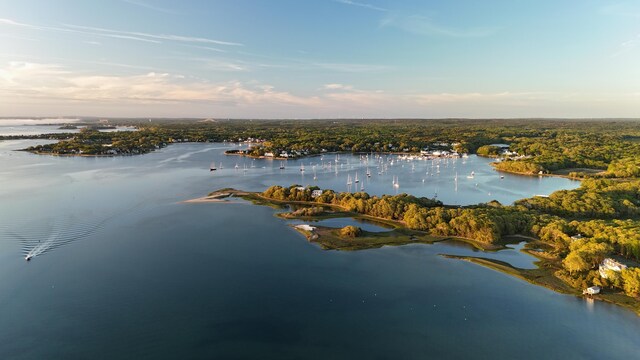 250 Scraggy Neck Rd, Cataumet, MA 02534 - aerial view of a large body of water and a heavily wooded area