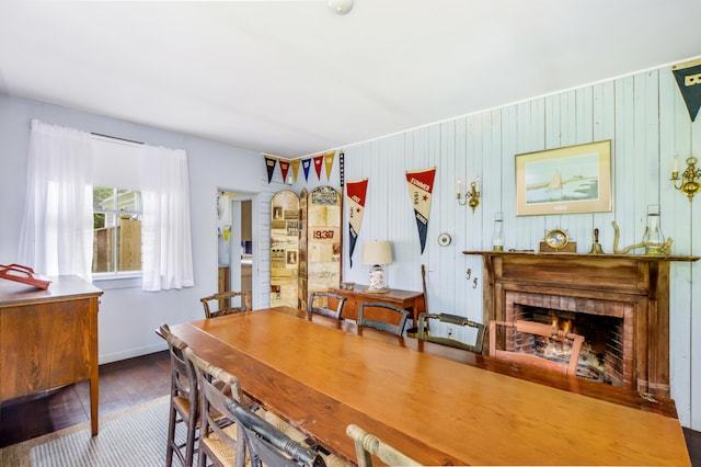 250 Scraggy Neck Rd, Cataumet, MA 02534 - dining room featuring wood finished floors and a brick fireplace