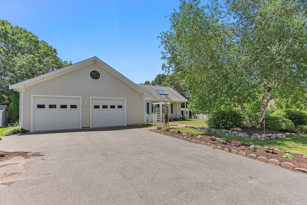 view of front of home with a garage