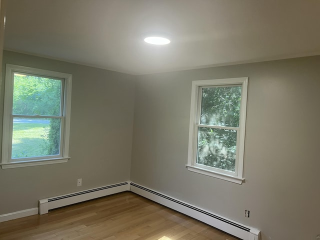 12 Pine Ter, East Sandwich, MA 02537 - unfurnished room featuring a baseboard heating unit and healthy amount of natural light