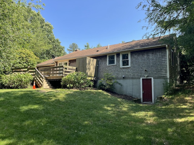 12 Pine Ter, East Sandwich, MA 02537 - back of house with a wooden deck and a yard