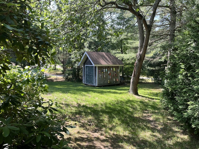 12 Pine Ter, East Sandwich, MA 02537 - view of green lawn featuring a storage unit
