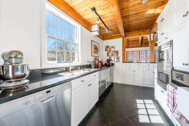 11 Allyn Ln, Barnstable, MA 02630 - kitchen featuring dark tile patterned floors, dishwasher, a sink, and wooden ceiling