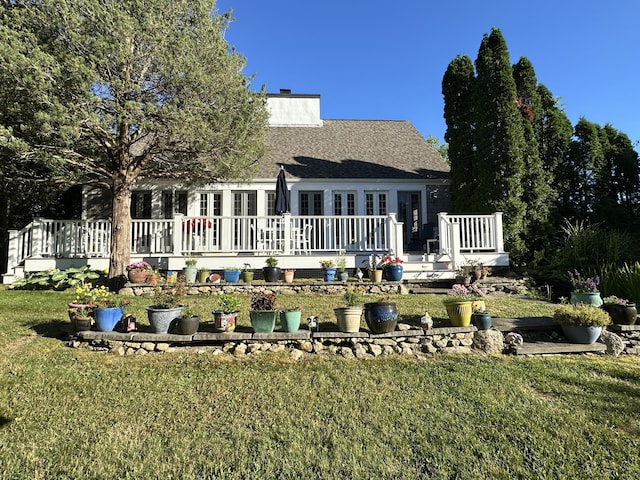 11 Allyn Ln, Barnstable, MA 02630 - rear view of property with roof with shingles, a chimney, a deck, and a lawn