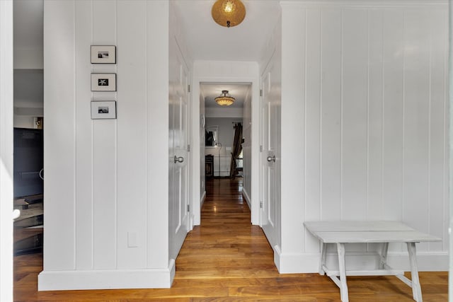 194 John Joseph Rd, Harwich, MA 02645 - corridor featuring light wood-type flooring and a decorative wall