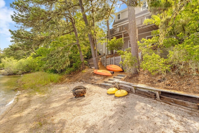 194 John Joseph Rd, Harwich, MA 02645 - view of yard featuring a fire pit, a patio area, and a balcony