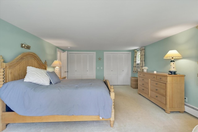 194 John Joseph Rd, Harwich, MA 02645 - bedroom featuring multiple closets, baseboard heating, and light carpet