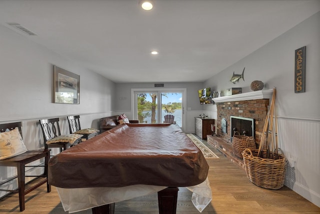194 John Joseph Rd, Harwich, MA 02645 - rec room featuring wood finished floors, a fireplace, and recessed lighting