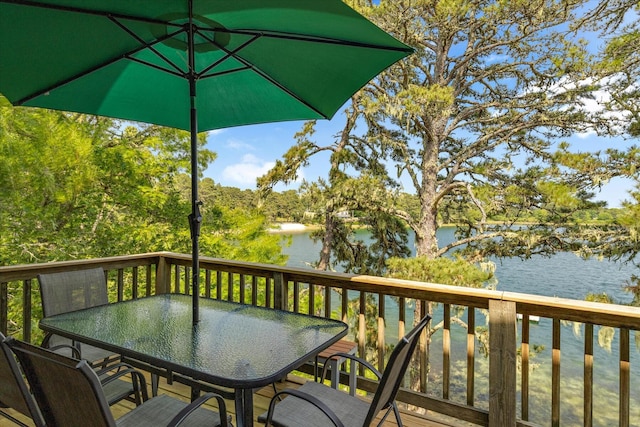 194 John Joseph Rd, Harwich, MA 02645 - wooden terrace with a water view and outdoor dining area