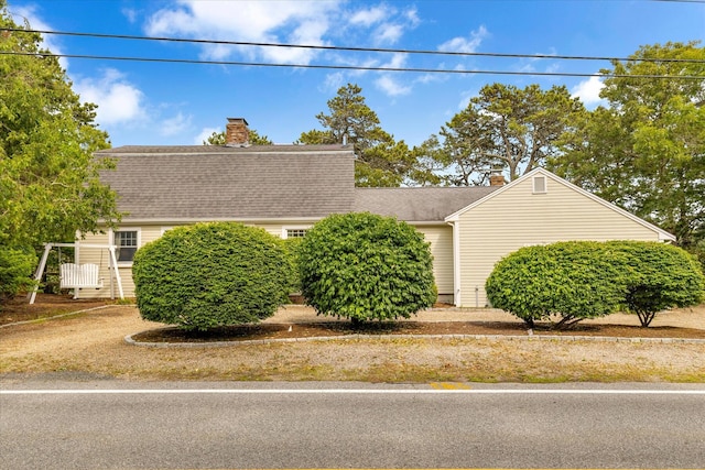 194 John Joseph Rd, Harwich, MA 02645 - dutch colonial with a chimney and roof with shingles