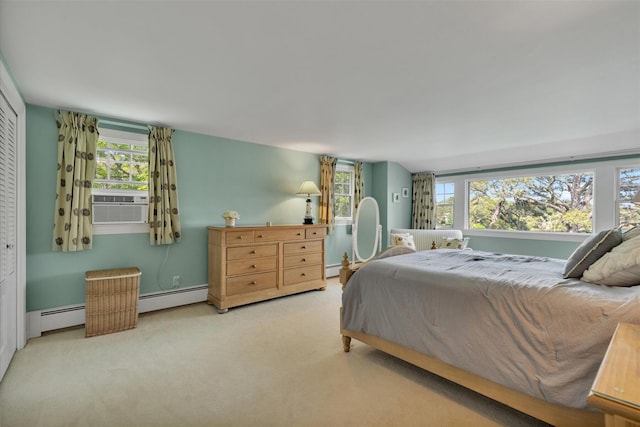 194 John Joseph Rd, Harwich, MA 02645 - carpeted bedroom featuring baseboard heating, multiple windows, and cooling unit