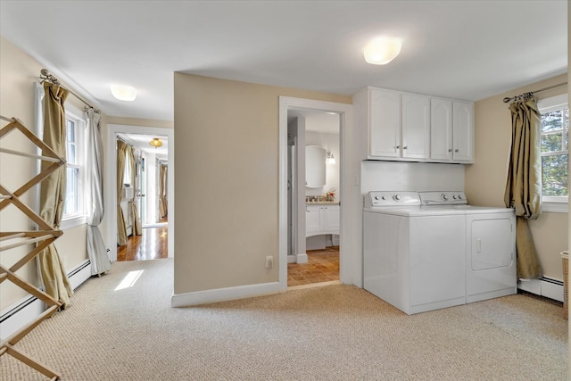 194 John Joseph Rd, Harwich, MA 02645 - washroom with washer and clothes dryer, light carpet, cabinet space, and a baseboard heating unit