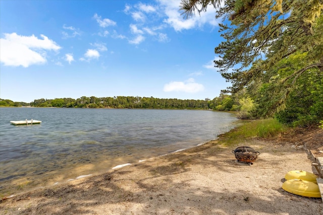 194 John Joseph Rd, Harwich, MA 02645 - water view with an outdoor fire pit and a heavily wooded area