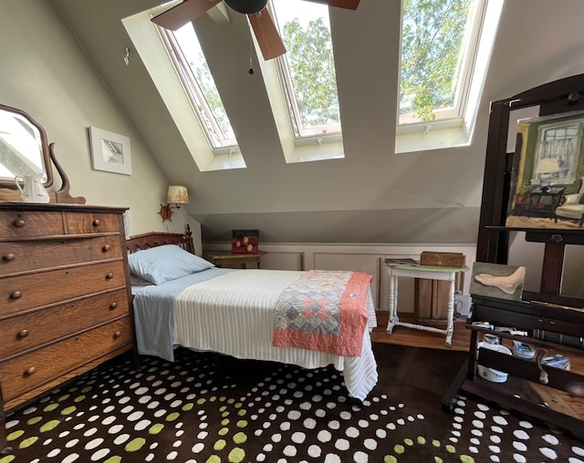 3 Fishburn Ct Unit U2, Provincetown, MA 02657 - bedroom with a skylight, dark colored carpet, vaulted ceiling, and wainscoting
