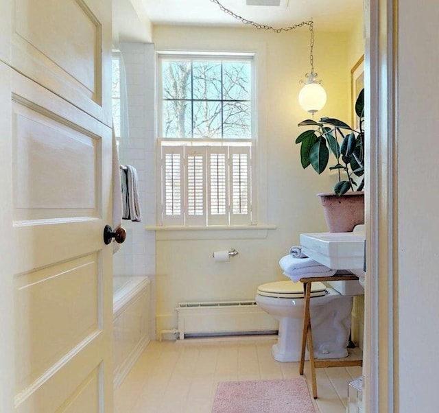 3 Fishburn Ct Unit U2, Provincetown, MA 02657 - bathroom with a baseboard radiator, plenty of natural light, and toilet