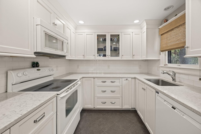 10 Seashore Park Dr Unit Ugg, Provincetown, MA 02657 - kitchen featuring white appliances, a sink, white cabinets, tasteful backsplash, and recessed lighting