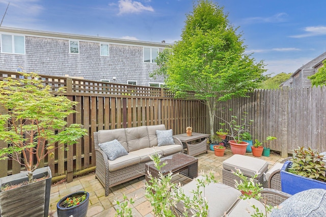 10 Seashore Park Dr Unit Ugg, Provincetown, MA 02657 - fenced backyard featuring an outdoor living space and a patio