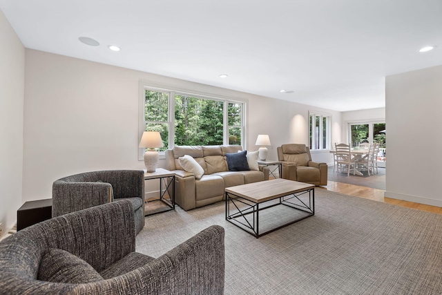 329 Waquoit Rd, Cotuit, MA 02635 - living area with light wood-style flooring and recessed lighting